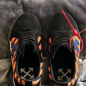 Off-White Black and Orange Sneakers with Dynamic Stripes
